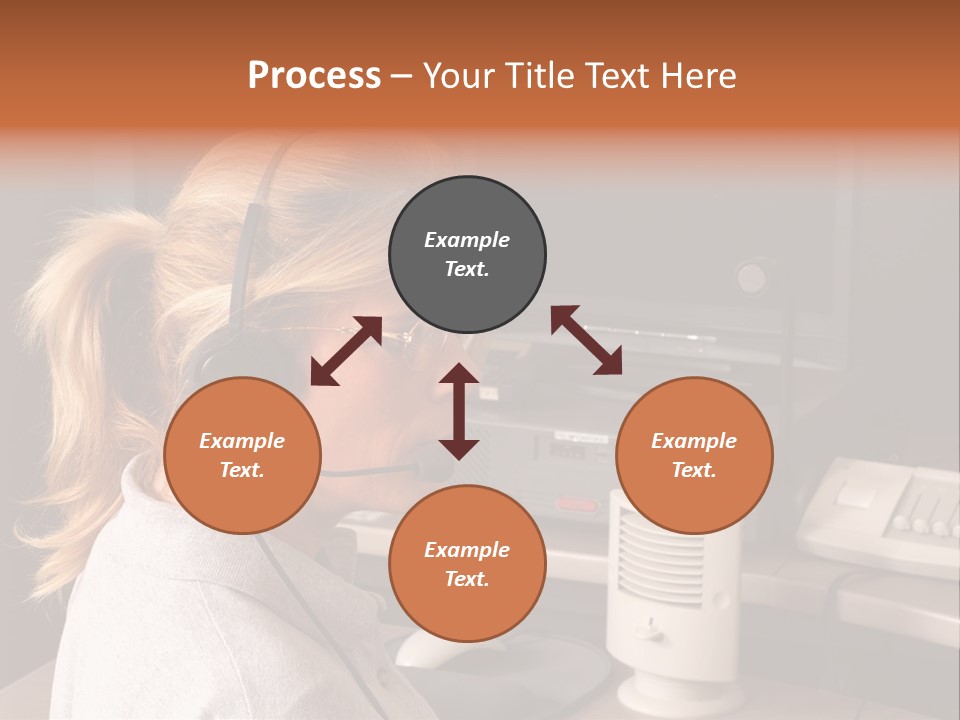 A Woman With A Headset Is Sitting In Front Of A Computer PowerPoint Template