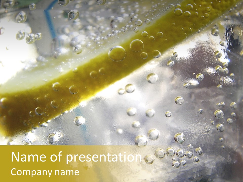 Close Up Of Lemon Slice In Liquid And Bubbles PowerPoint Template