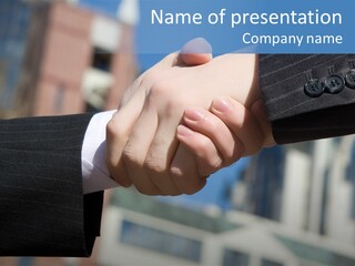 Business Handshake Over Blurry Background PowerPoint Template