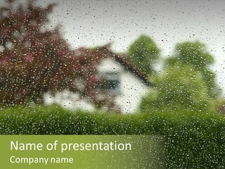 View Of Suburban House Through Window Covered With Raindrops In Spring. PowerPoint Template