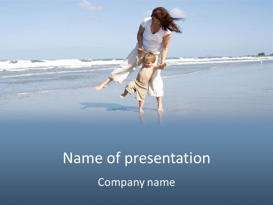 Mom And Son Playing On A Beach, Ocean And Blue Sky In The Background PowerPoint Template