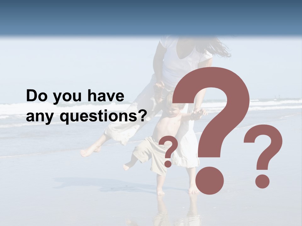 Mom And Son Playing On A Beach, Ocean And Blue Sky In The Background PowerPoint Template