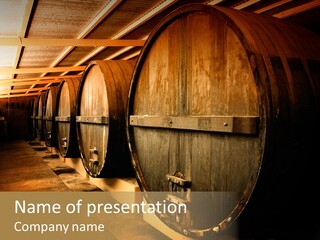 Large Barrels At A Winery In South Australia PowerPoint Template