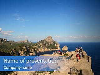 A Group Of People Walking Up A Hill Next To A Body Of Water PowerPoint Template