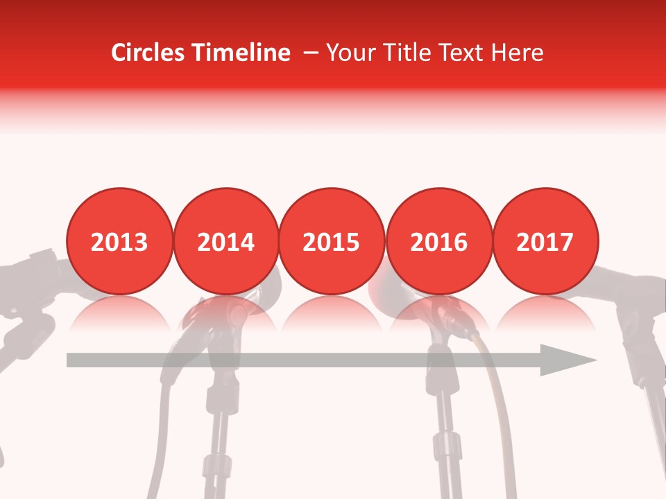 A Row Of Microphones With A Red Cord PowerPoint Template
