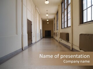 A Long Hallway In An Old High School PowerPoint Template