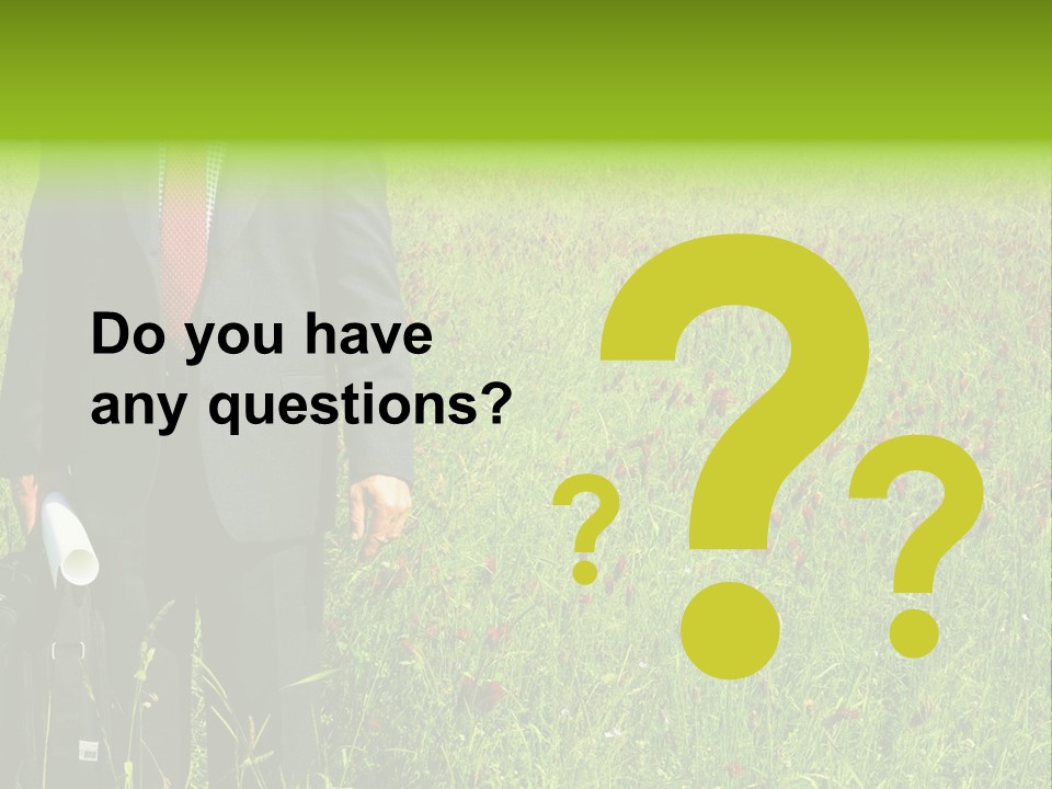 A Businessman In Grass. PowerPoint Template