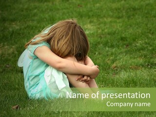 A Pouty Child In A Field. PowerPoint Template