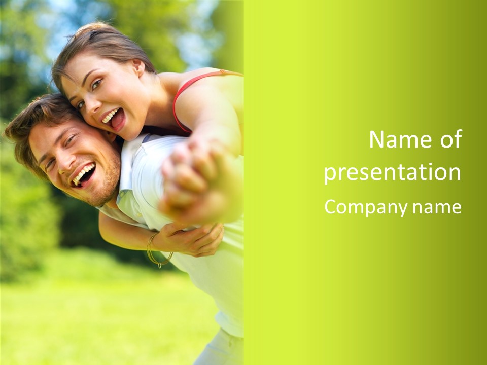 A Man Holding A Woman On His Back In A Field PowerPoint Template