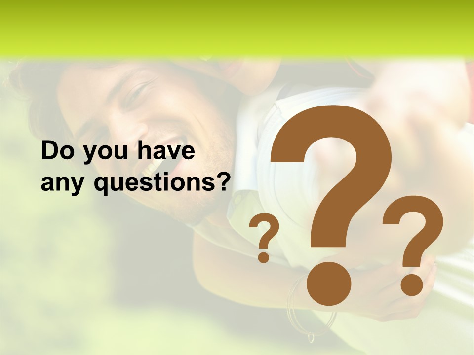 A Man Holding A Woman On His Back In A Field PowerPoint Template