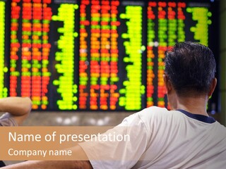 Asian Man Watching Stock Market Index PowerPoint Template