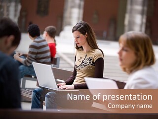 Beautiful Young Woman Working With Her Notebook Is Sitting Outdoors PowerPoint Template