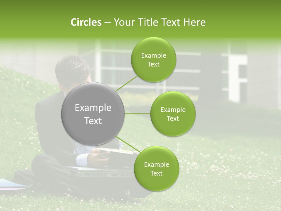 Business Man With Laptop And Notebook Working In The Park In Front Of Office Building PowerPoint Template