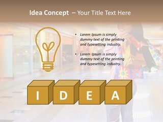 Shopping Young Woman Smiling In The Shopping Mall. PowerPoint Template