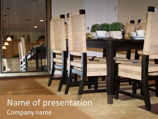 A Dining Room Table With Chairs And Plates On It PowerPoint Template