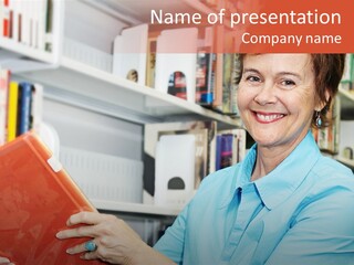 A Pretty Librarian In Her Wheelchair Shelving Books. PowerPoint Template