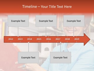 A Pretty Librarian In Her Wheelchair Shelving Books. PowerPoint Template