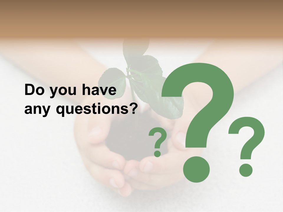 Small Green Plant In Children's Palms PowerPoint Template