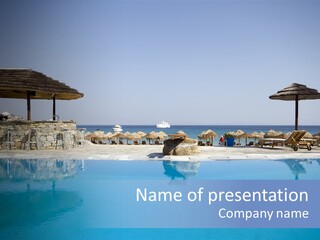 Swimming Pool By Sea At Resort Hotel Luxurious Greek Island With Stone Bar PowerPoint Template