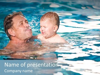 Grandfather And Grandson Playing Together In The Pool. Outdoor, Summer. PowerPoint Template