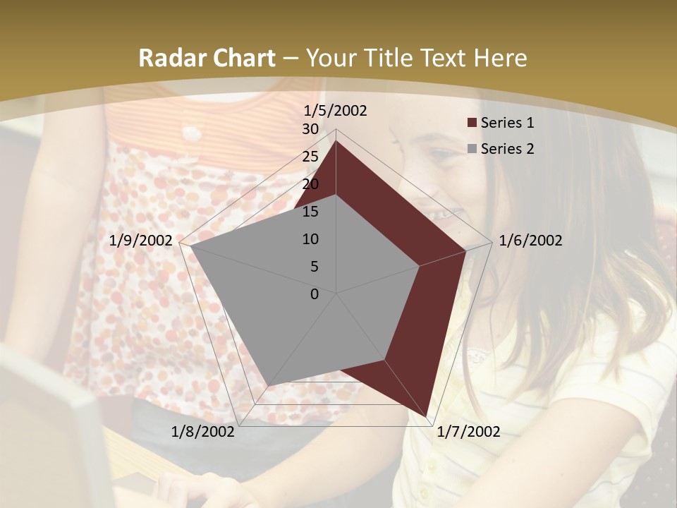Two Cute School Girls Doing Research On-Line In The School Library. Focus On The Girl Sitting Down. PowerPoint Template