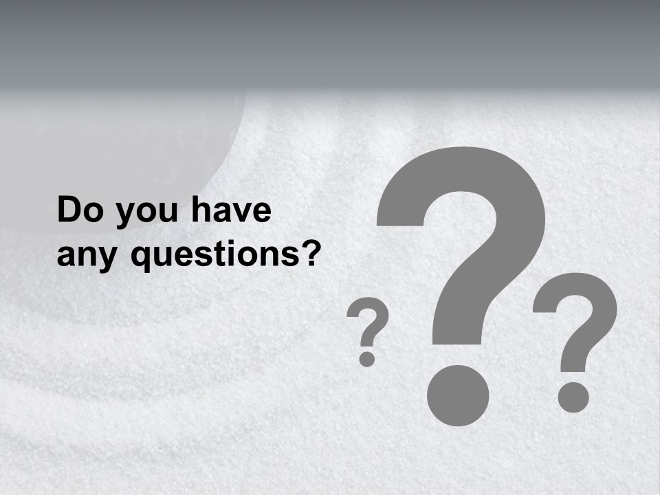 A Black Stone On A Wave Of White Sand In A Zen Garden PowerPoint Template