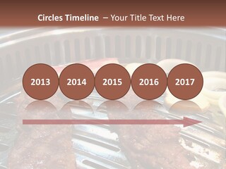 A Bunch Of Food That Is On A Grill PowerPoint Template