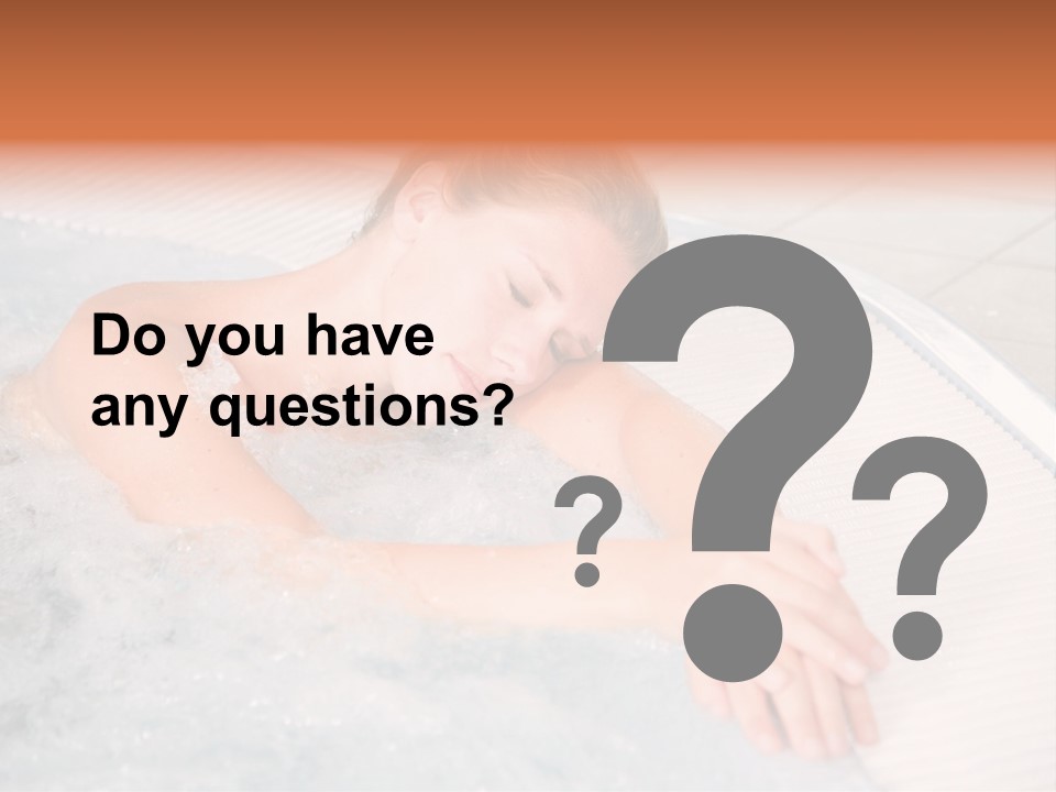 Pretty Blond Woman Relaxing In The Whirlpool PowerPoint Template