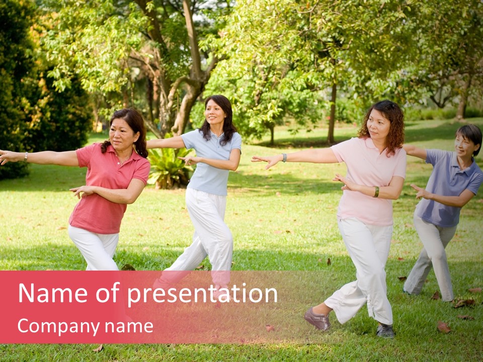 A Group Of Asian Ladies Exercising In The Park PowerPoint Template