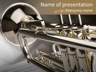 Trumpet On Musical Notes As Background Close Up PowerPoint Template