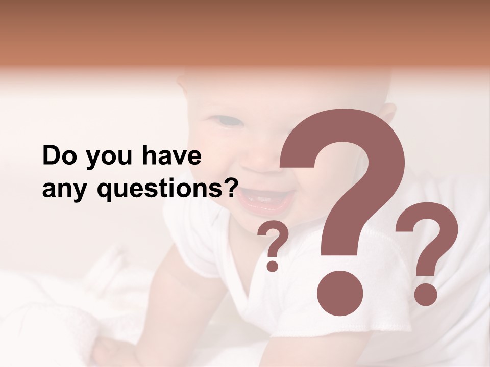 A Charming Portrait Of A Little Baby Boy. He Is 6 Months Old In This Series. PowerPoint Template