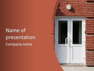 A Red Brick Building With A White Door PowerPoint Template