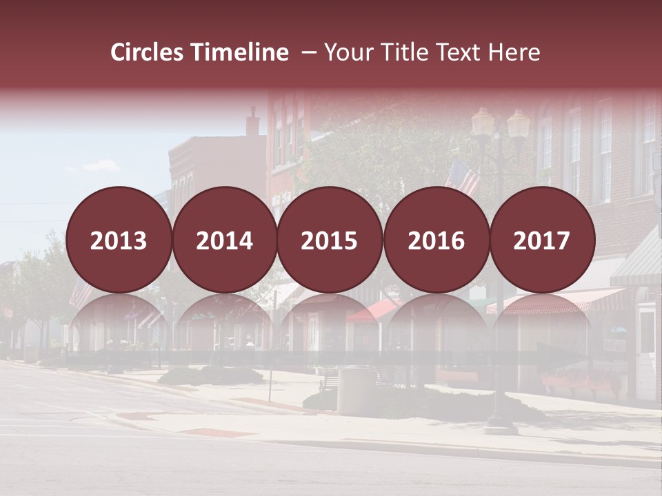 A Main Street In A Typical Midwest Small Town, Complete With U.s. Flags. PowerPoint Template