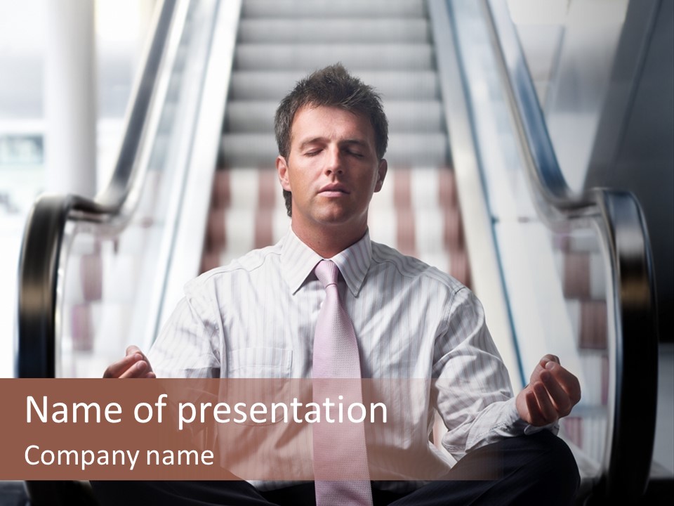 Businessman Meditating In Lotus Position In Front Of An Escalator Indoor. PowerPoint Template