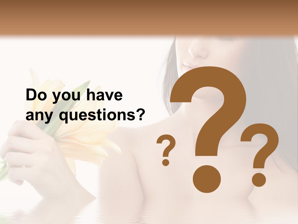 Happy Brunette With Yellow Lily Flowers In Spa PowerPoint Template