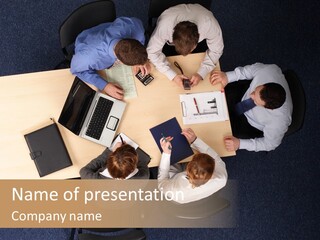 Five Business People Meeting - Businesspeople Gathered Around A Table For A Meeting, Brainstorming. Aerial Shot Taken From Directly Above The Table. PowerPoint Template