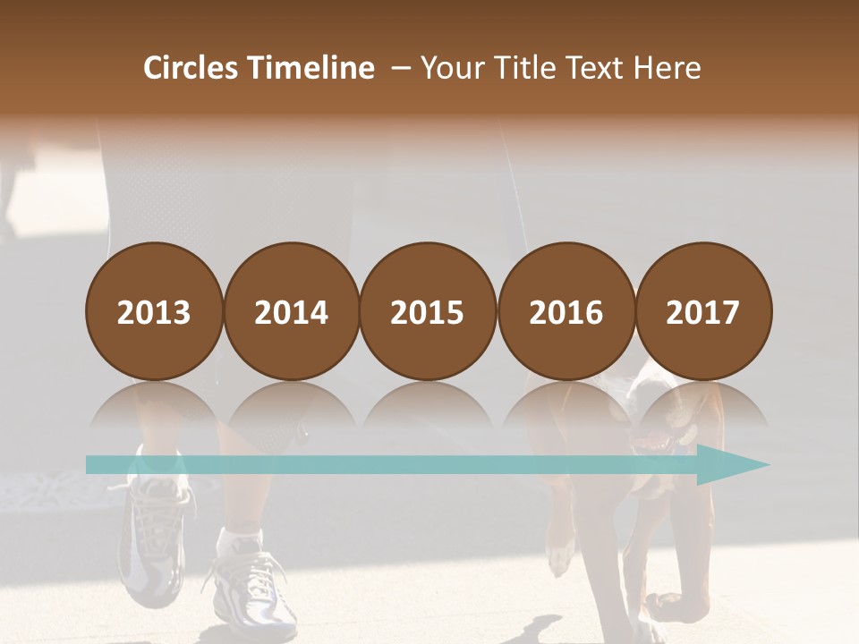 A Person Walking A Brown And White Dog On A Leash PowerPoint Template