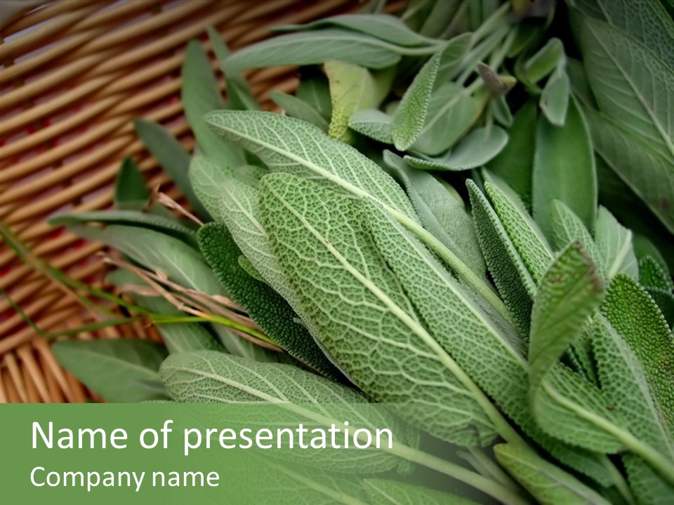 A Basket Filled With Green Leaves On Top Of A Table PowerPoint Template