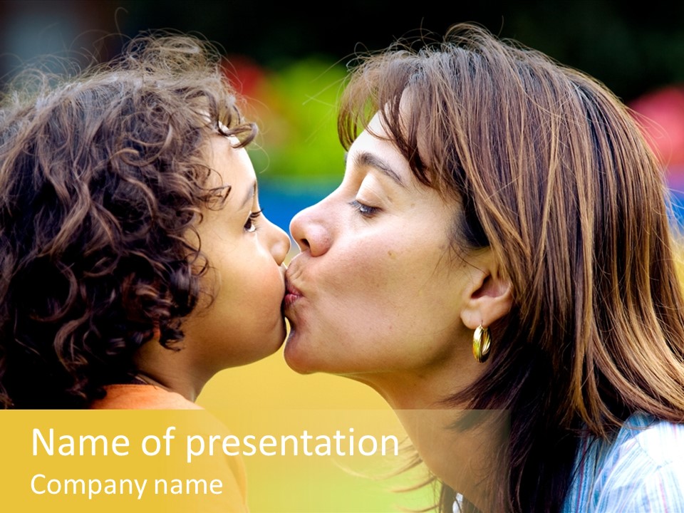 Family Love - Mother And Son Portrait Kissing Outdoors On A Sunny Day PowerPoint Template