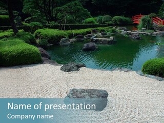 A Japanese Garden With A Pond And Bridge PowerPoint Template