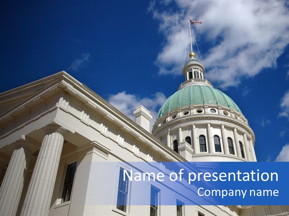 A White Building With A Green Dome Under A Blue Sky PowerPoint Template