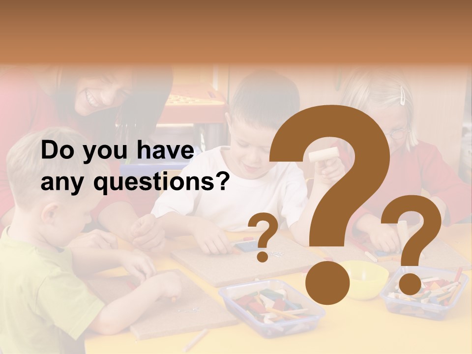 Teacher And Three Preschoolers Playing With Wooden Blocks PowerPoint Template