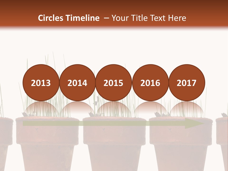 A Row Of Pots With Grass Growing Out Of Them PowerPoint Template