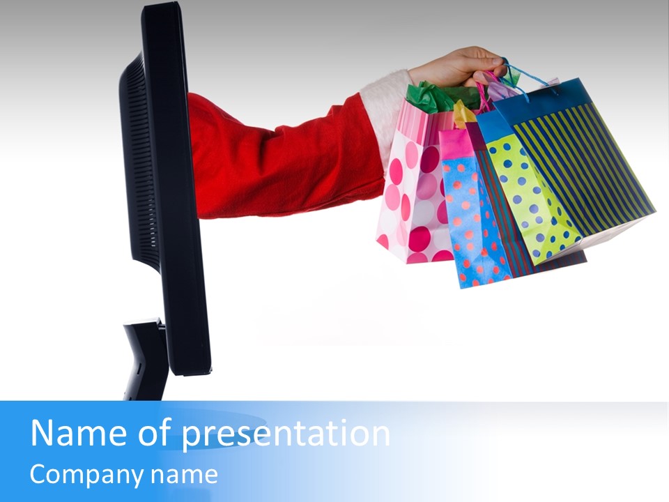 Santa Clause Sticking Hand Out Of Monitor With Gifts PowerPoint Template