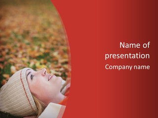 Young Woman Lying In The Fall Leaves PowerPoint Template