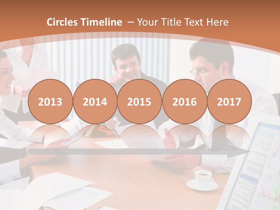 Portrait Of Four Professionals Sitting At The Table And Discussing A Business Idea In The Office PowerPoint Template