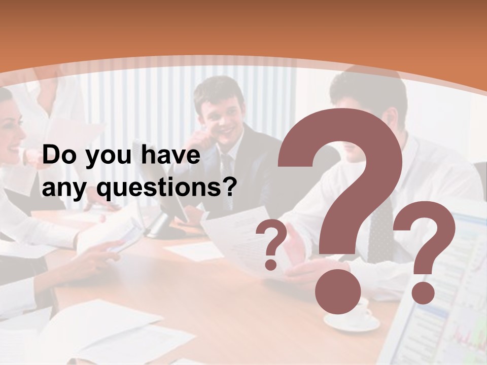 Portrait Of Four Professionals Sitting At The Table And Discussing A Business Idea In The Office PowerPoint Template