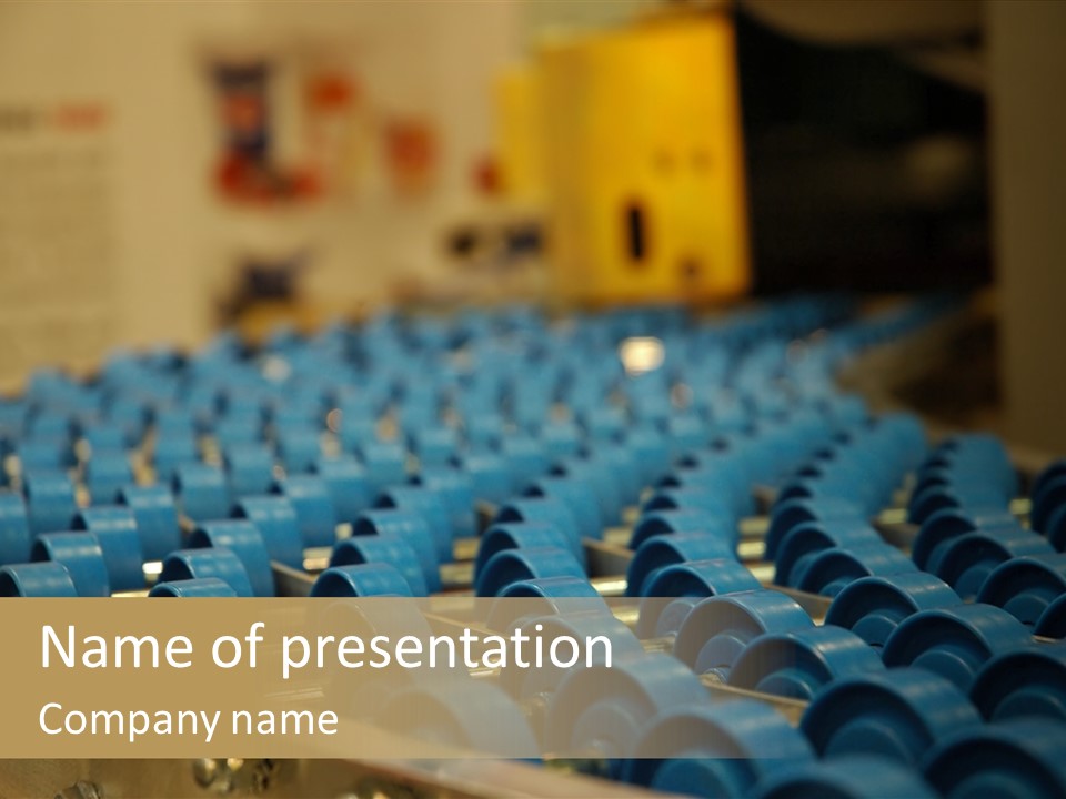 Rows Of Blue Plastic Chairs In A Factory PowerPoint Template