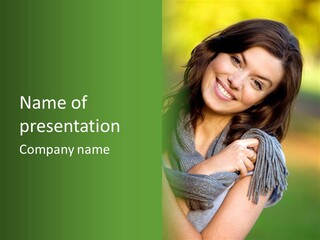 Beautiful Female Portrait Outdoors Smiling And Playing With Her Scarf PowerPoint Template