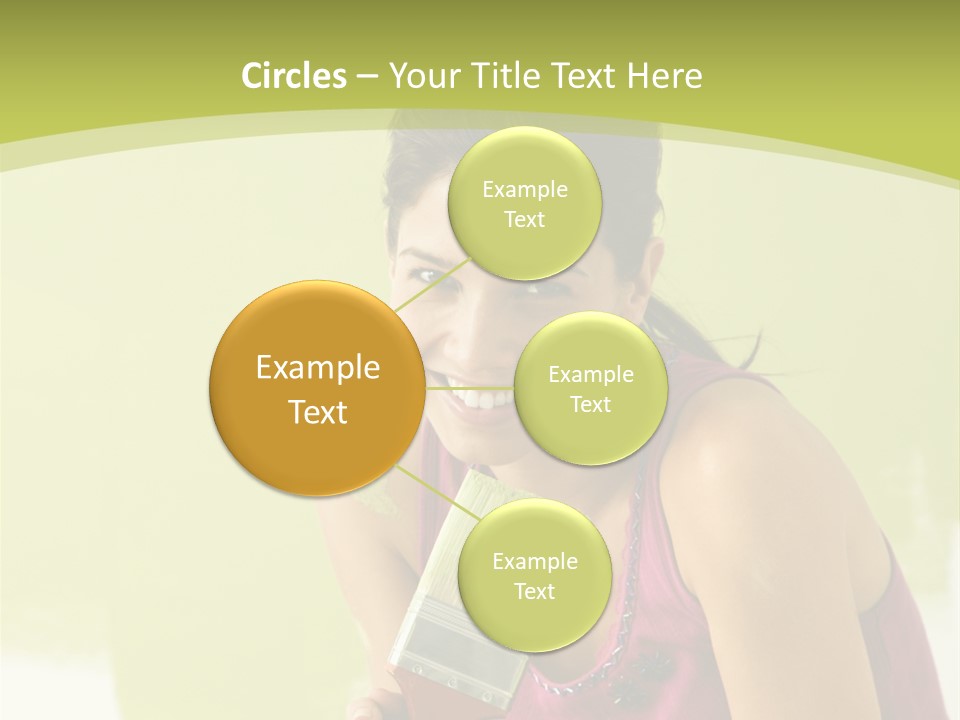 Pretty Smiling Woman Kneeling In Front Of Partially Painted Wall Holding Paintbrush. PowerPoint Template